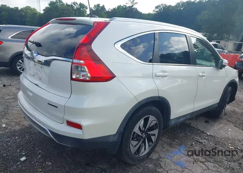 2015 Honda Cr-V Touring z USA, uszkodzony, nr VIN 5J6RM3H95FL025882
